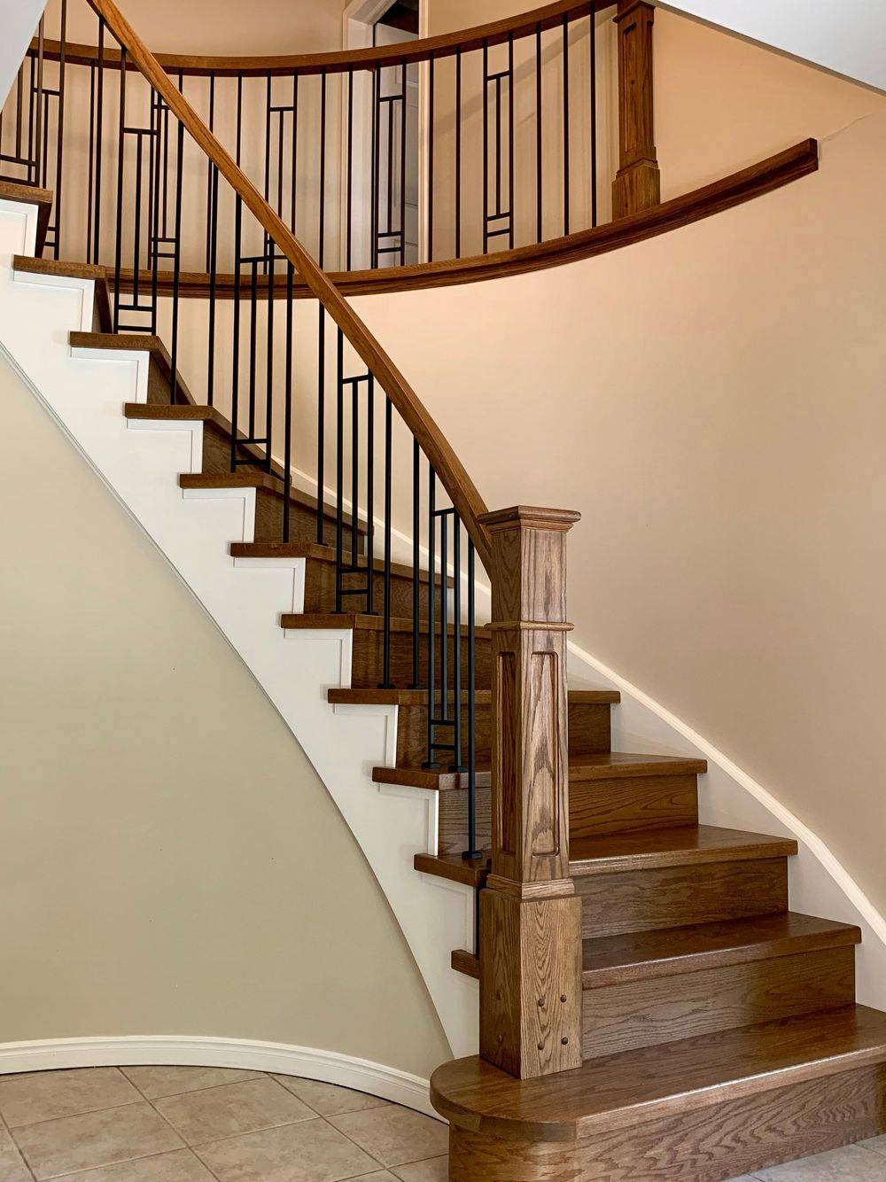 dark wooden rounded staircase