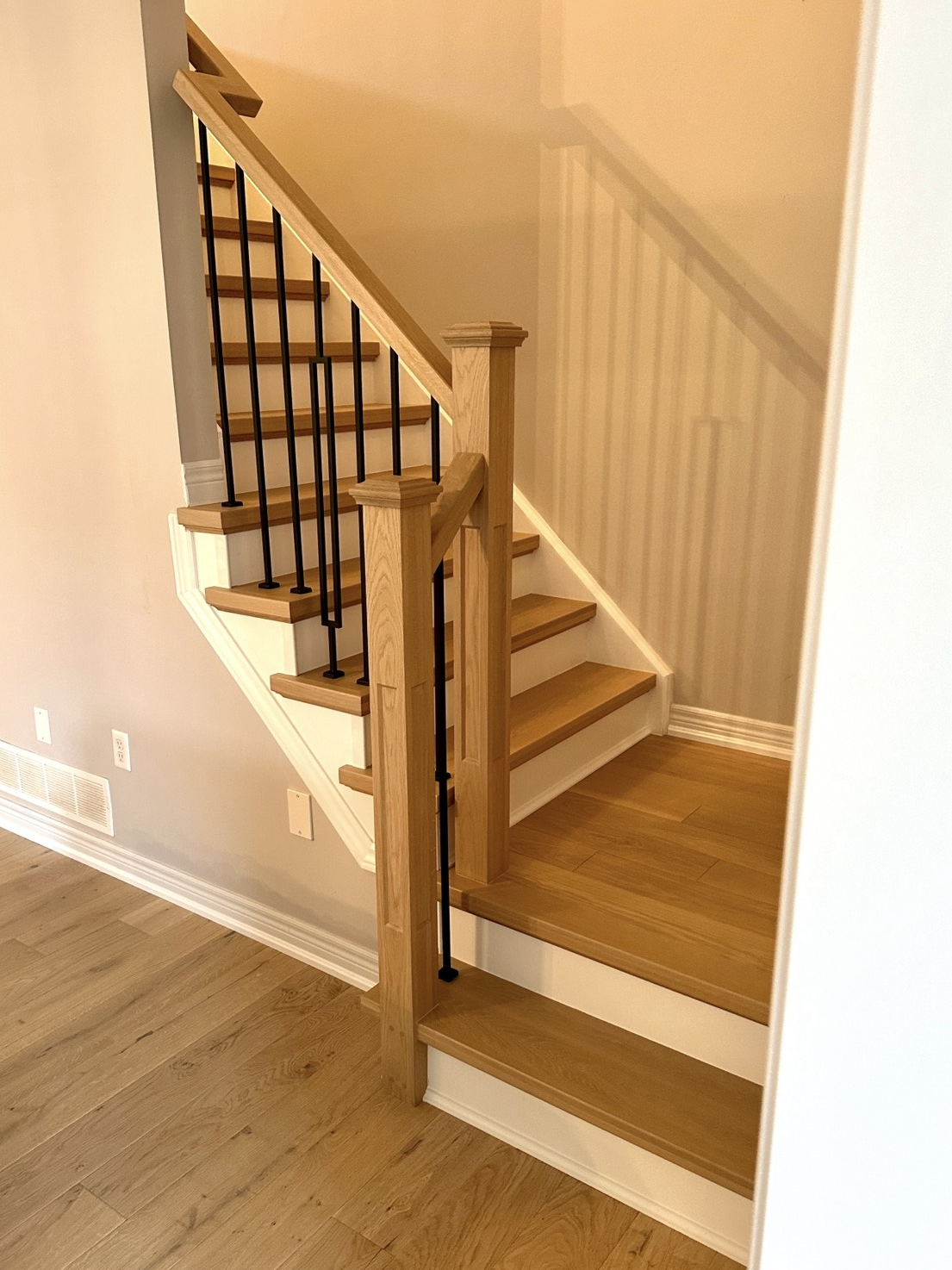 light wooden corner staircase 