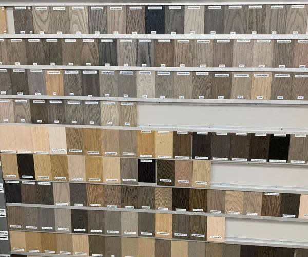 a wall display of various stain color samples