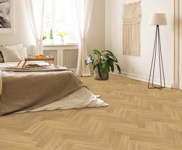 chevron hardwood flooring design in bedroom